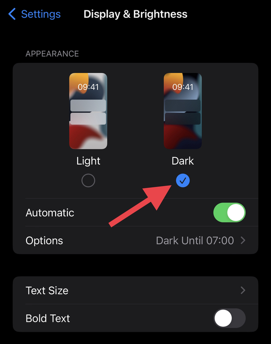 How to activate dark mode under the display & brightness settings