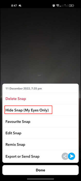 Tapping the "Hide Snap" option in Snapchat.