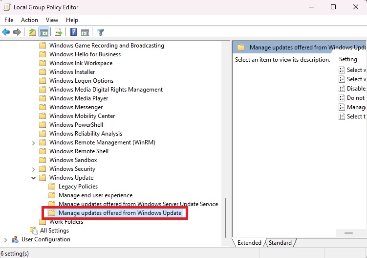 Navigating to "Manage updates offered from Windows Update" policy in Local Group Policy Editor.