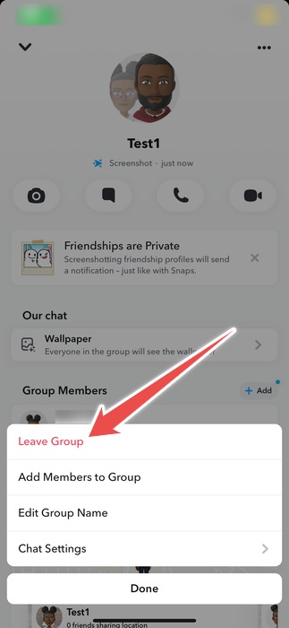 Tapping "Leave Group" option from menu that pops up at the bottom in Snapchat app. 