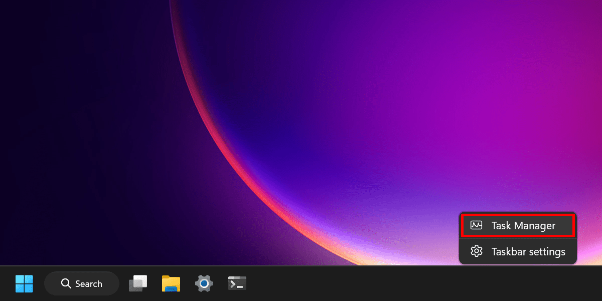 Right-clicking the taskbar to open the Task Manager.