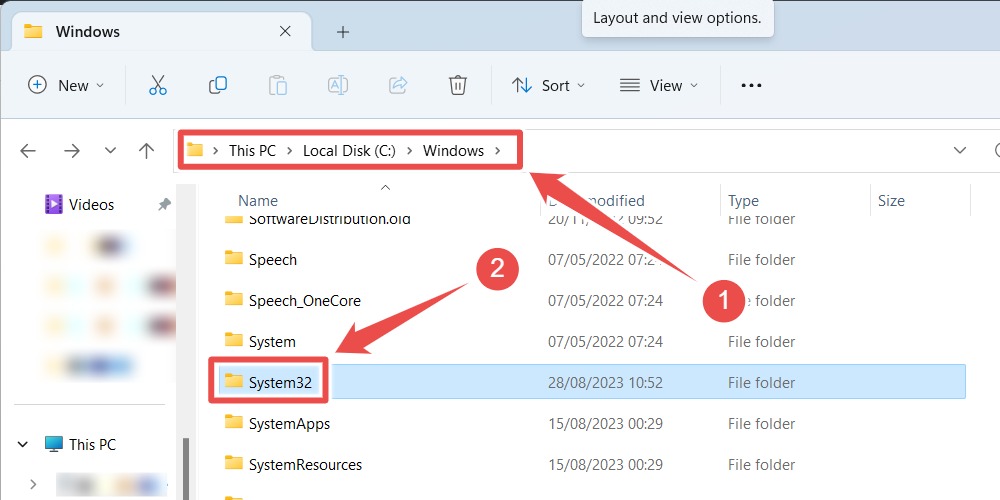 Opening the "System32" folder via File Explorer.