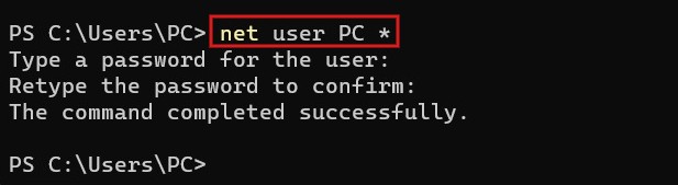 Typing net user command in PowerShell.