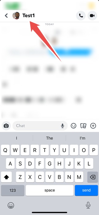 Tapping the group chat name in the Snapchat app. 