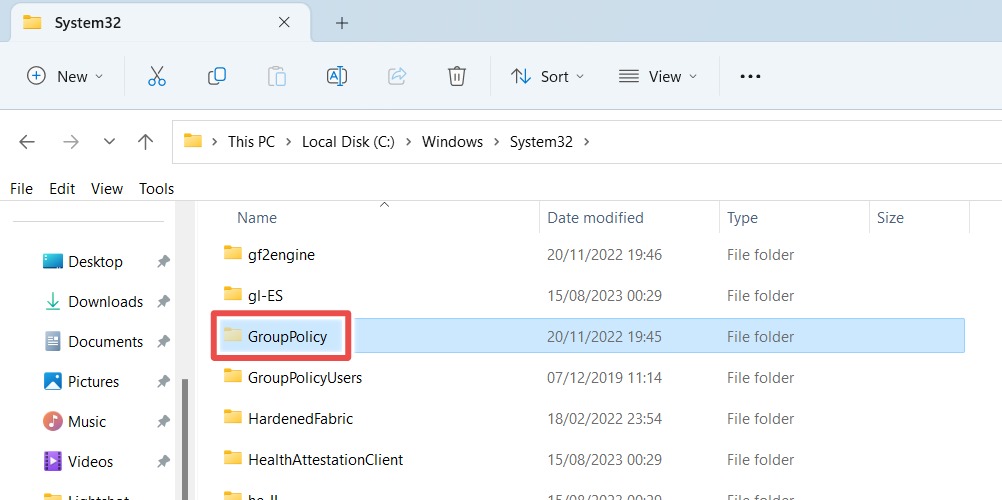The Group Policy folder in System32 via File Explorer.