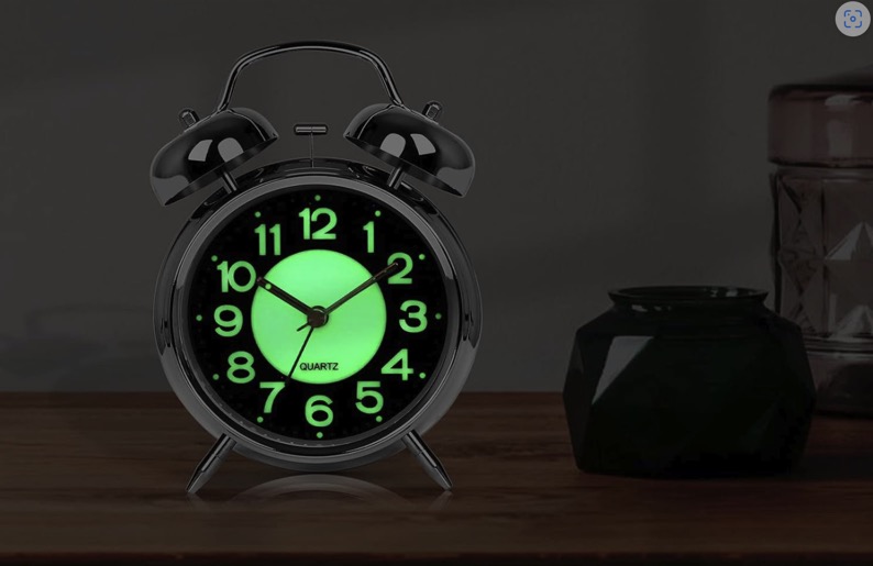 Annoying Alarm Clock Glowing at Night