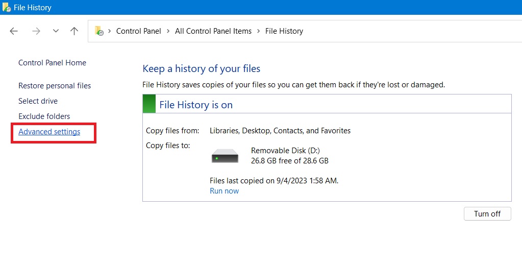 Changing File History backup settings by clicking "Advanced settings."