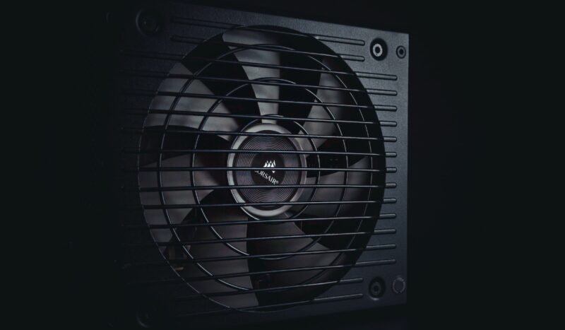 A PC power supply covered in shadow