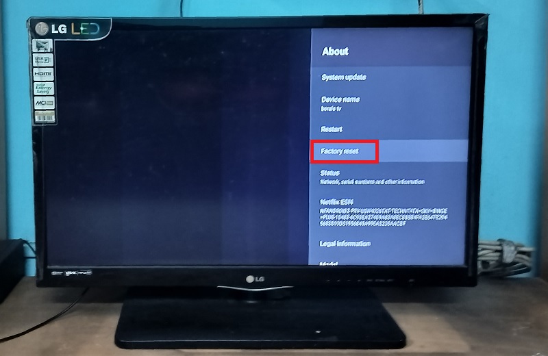Highlighted "factory reset" menu of Android TV in the "About" section