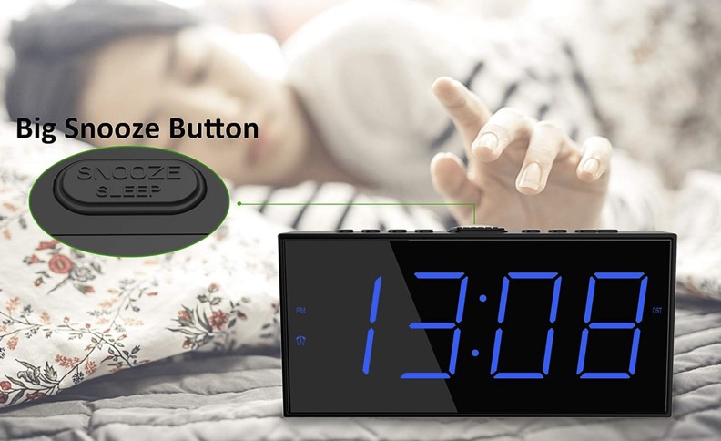 Person Turning Off Annoying Alarm Clock