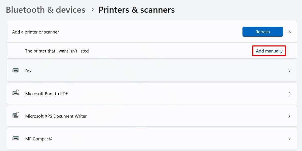 Clicking the option to add a printer manually to Windows.