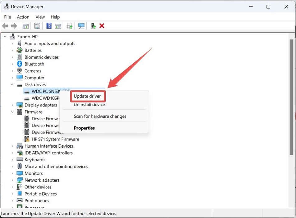 Clicking the option to update driver for disk drive on Windows.
