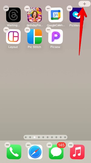 Clicking on "+" button to add widget on iPhone. 