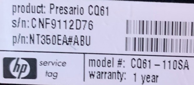 Sticker view on laptop back/front showing model number details.