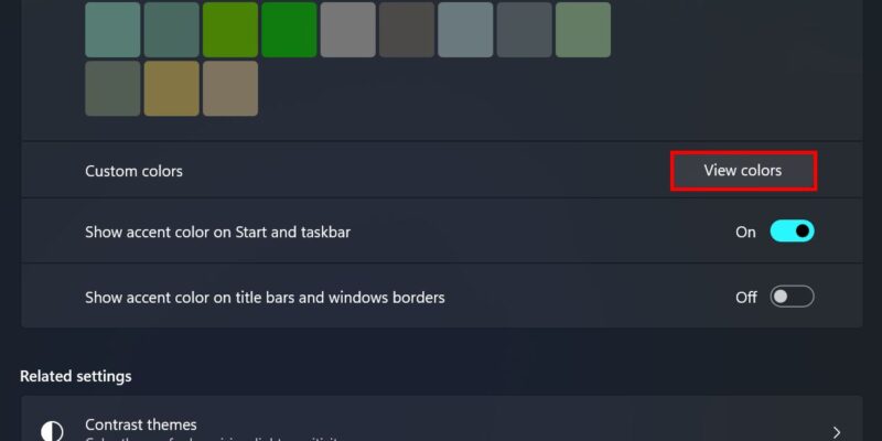 Clicking the "View colors" button to set custom color for taskbar in Windows.