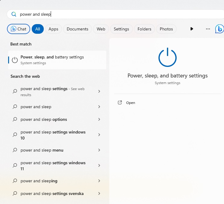 Typing "power and sleep" in Windows Search.