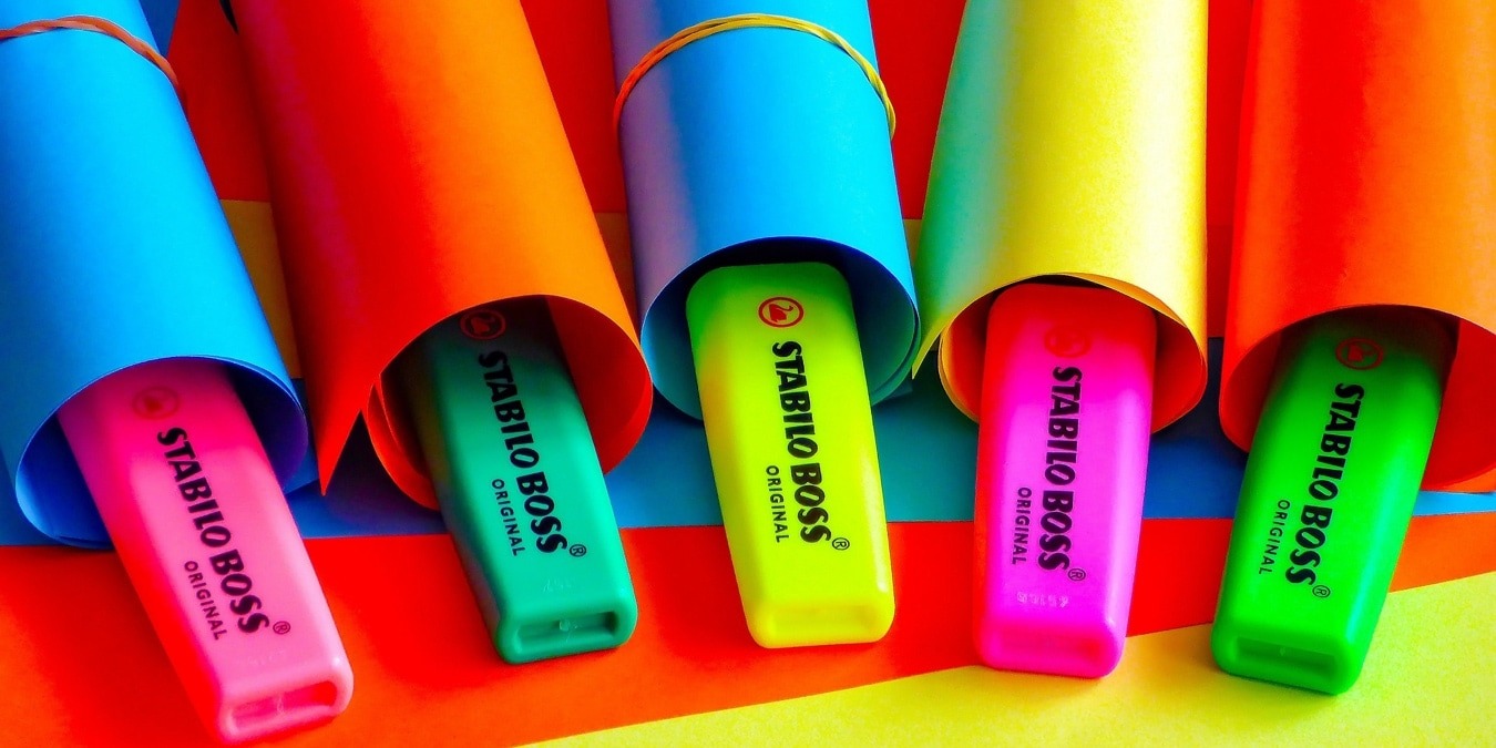 Highlighters and colored paper