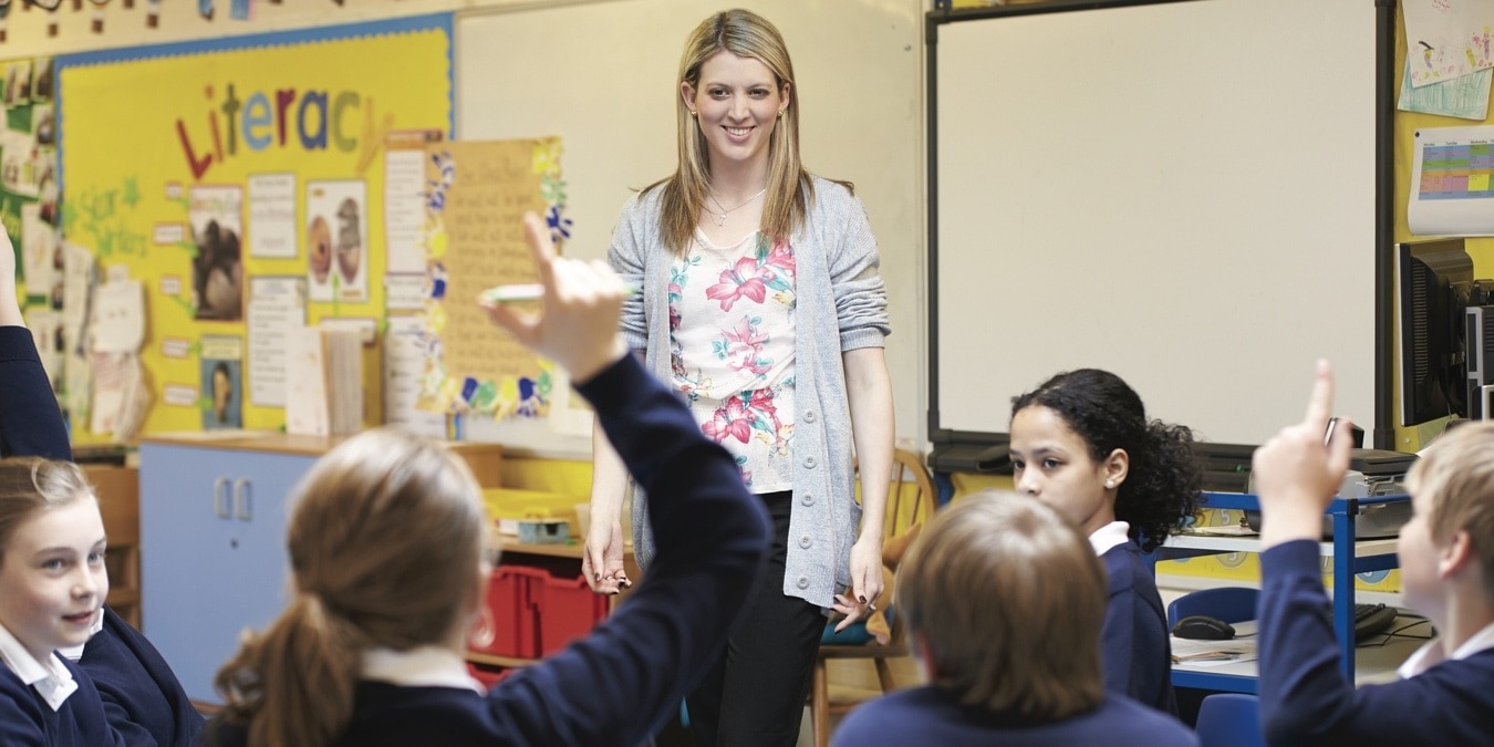 Teacher with a class in school