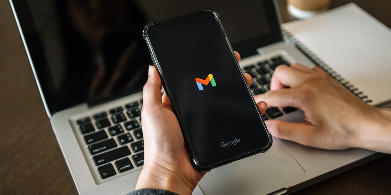 March 08, 2022: Hand Holding A Smartphone With Gmail App On The