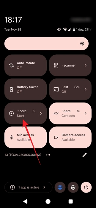 Tapping on Screen Recorder toggle in Quick Settings on Android phone.