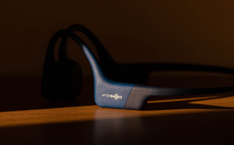 Bone conduction headphone placed on the table.