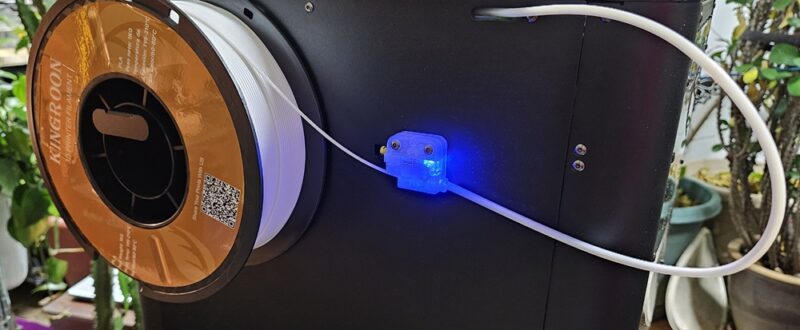 Filament feeding into sensor on back of machine.