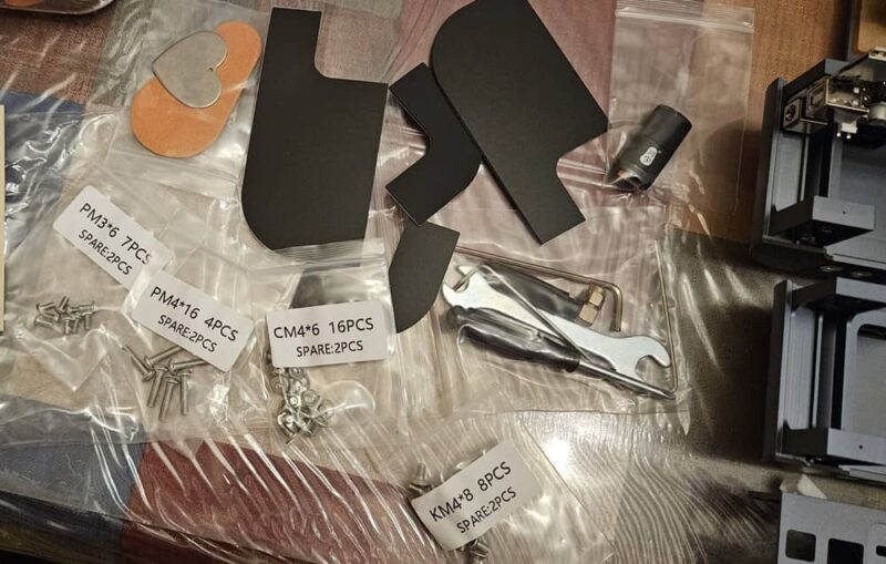 Phecda Laser Engraver And Cutter spare screws and tools.