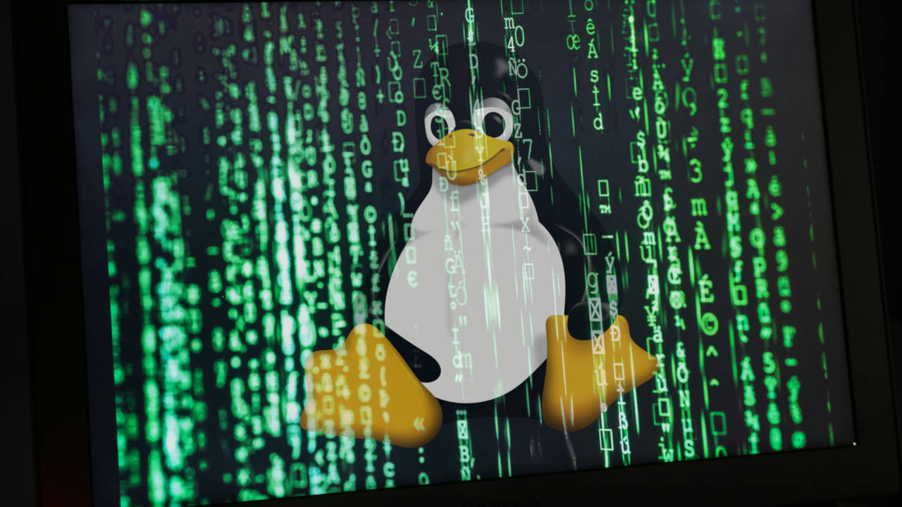 A photograph of a laptop screen running a graphical matrix screen.