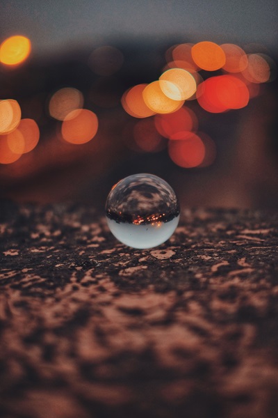 Shot of a tiny sphere with bokeh effect applied.