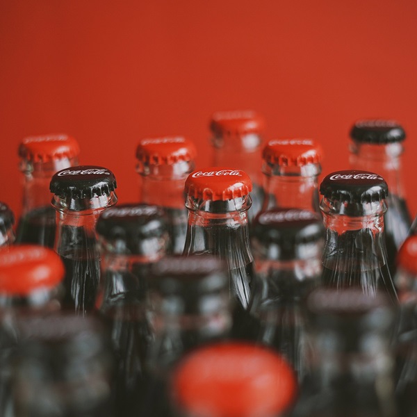 Shot of a Coca Cola bottles with bokeh effect applied.