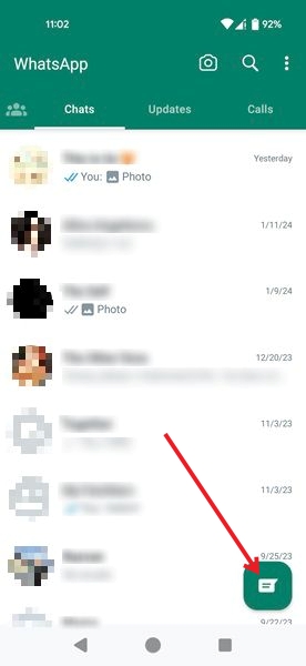 Tapping on message button in WhatsApp for Android.