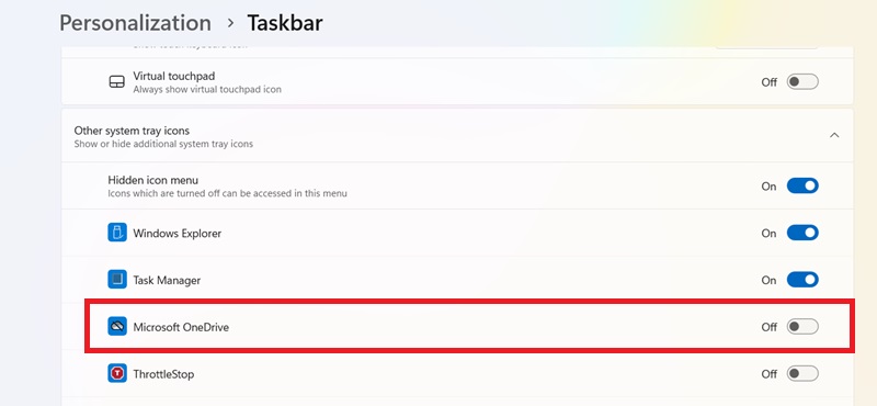 Toggle off OneDrive in System Tray settings.