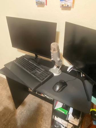 Gaming PC setup with dual monitors