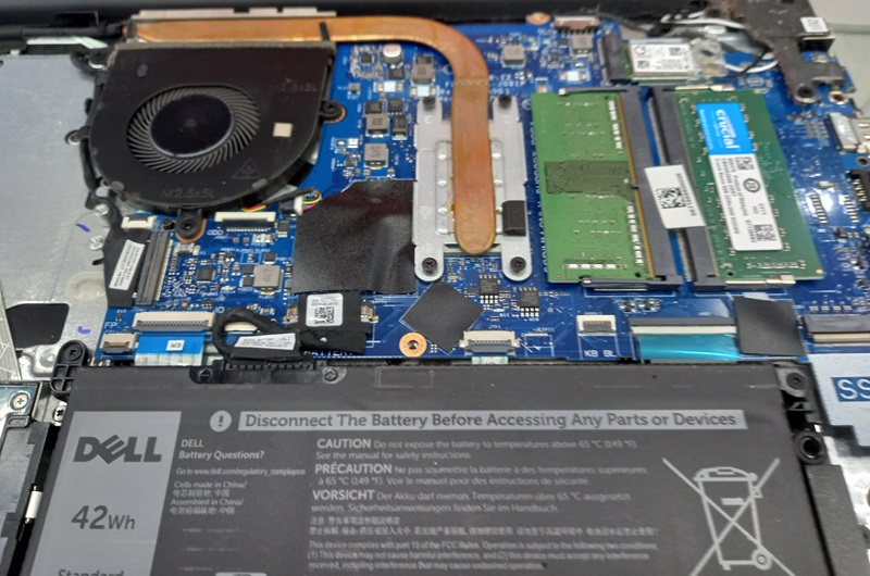 Internal components of my Dell laptop visible.