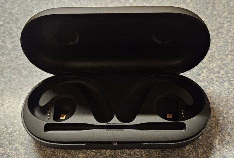 Earbud case opened up.