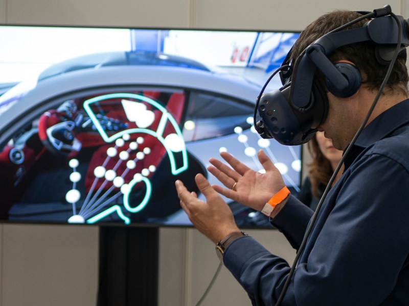 Person using a VR headset for automotive design