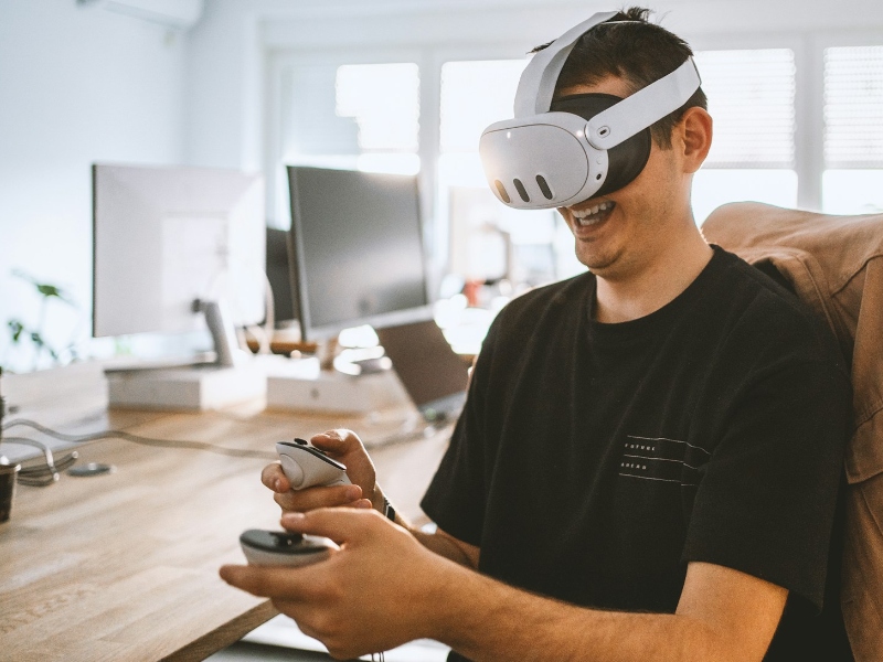 Person using the Meta Quest 3 VR headset