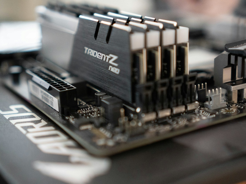Close up of four RAM sticks on a motherboard