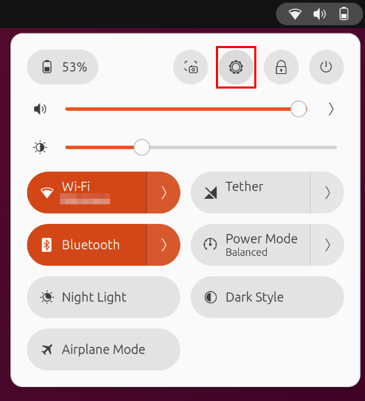 A screenshot highlighting the Settings button on the Ubuntu Quick Menu.