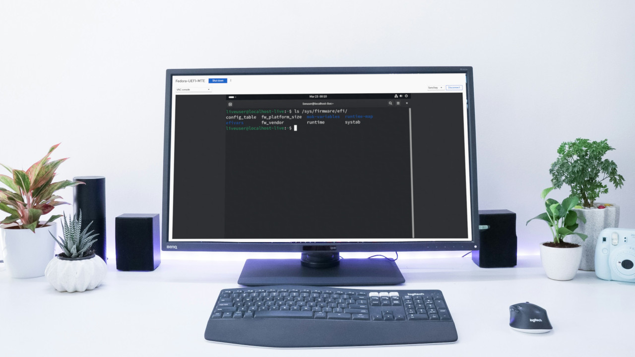 A photograph of a desktop PC on top of a white table.