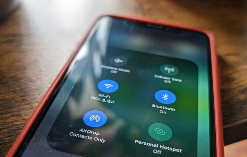 Bluetooth toggle visible on mobile device.