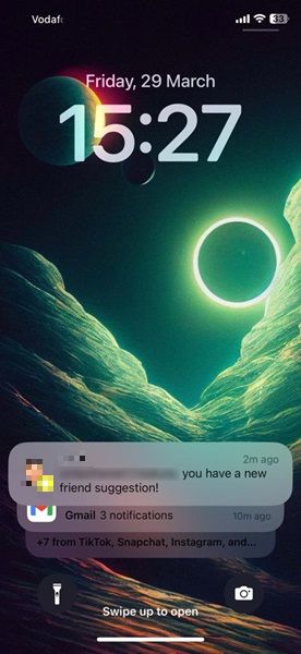 Viewing notifications at lock screen on iPhone.