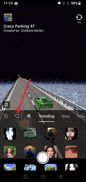 Tapping on magnifying glass icon in TikTok Effects page.