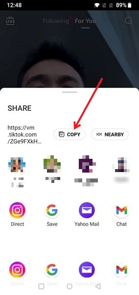 Tapping Copy option in Share menu in TikTok app.
