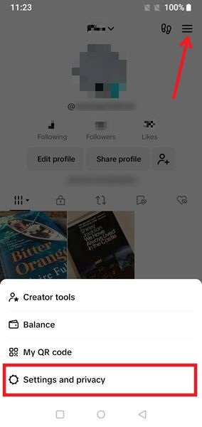 Selecting "Settings and privacy" option after pressing on hamburger menu in TikTok profile page.