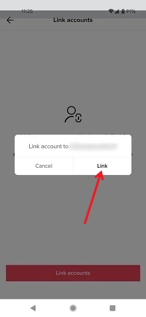 Pressing "Link" button in pop-up to confirm account linking.