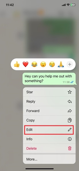 Selecting "Edit" option in WhatsApp for iPhone.