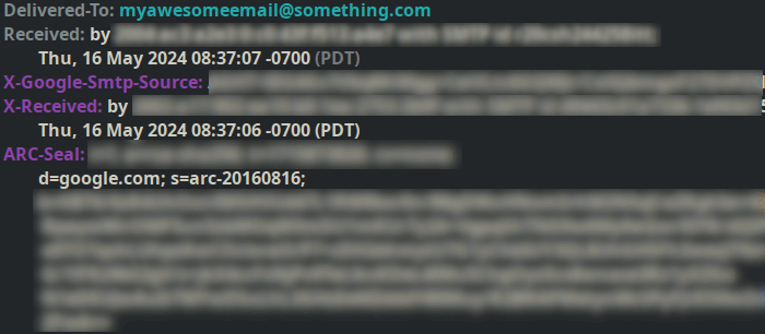 The final delivery portion of an email header with authentication details blurred out.
