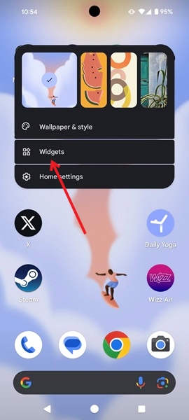 Long-pressing on Android home screen to view Widgets option.