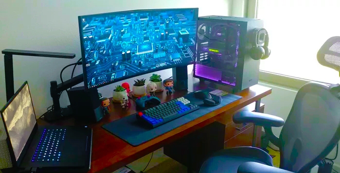 Gaming PC setup on desk with a chair